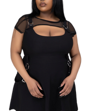 Load image into Gallery viewer, model wearing a black dress with sheer shoulder panels on a white background