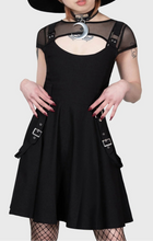 Load image into Gallery viewer, model wearing a black dress with sheer sleeves and a black hat on a white background
