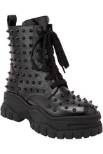 Load image into Gallery viewer, side of Black vegan leather platform boots with black studs all over. Lace-up front with side zipper. 100% polyurethane.