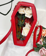 Load image into Gallery viewer, Red vegan leather coffin shaped bag with see through front. Inside of bag has black cross detail. Bag has full zip closure around entirety of coffin shape. Bag has adjustable shoulder strap.