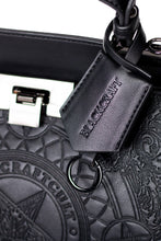 Load image into Gallery viewer, Embossed baphomet goat detail on front. Gunmetal hardware. Removable adjustable over the shoulder straps. Attached top handle for carrying.