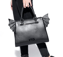 Load image into Gallery viewer, model holding bag
